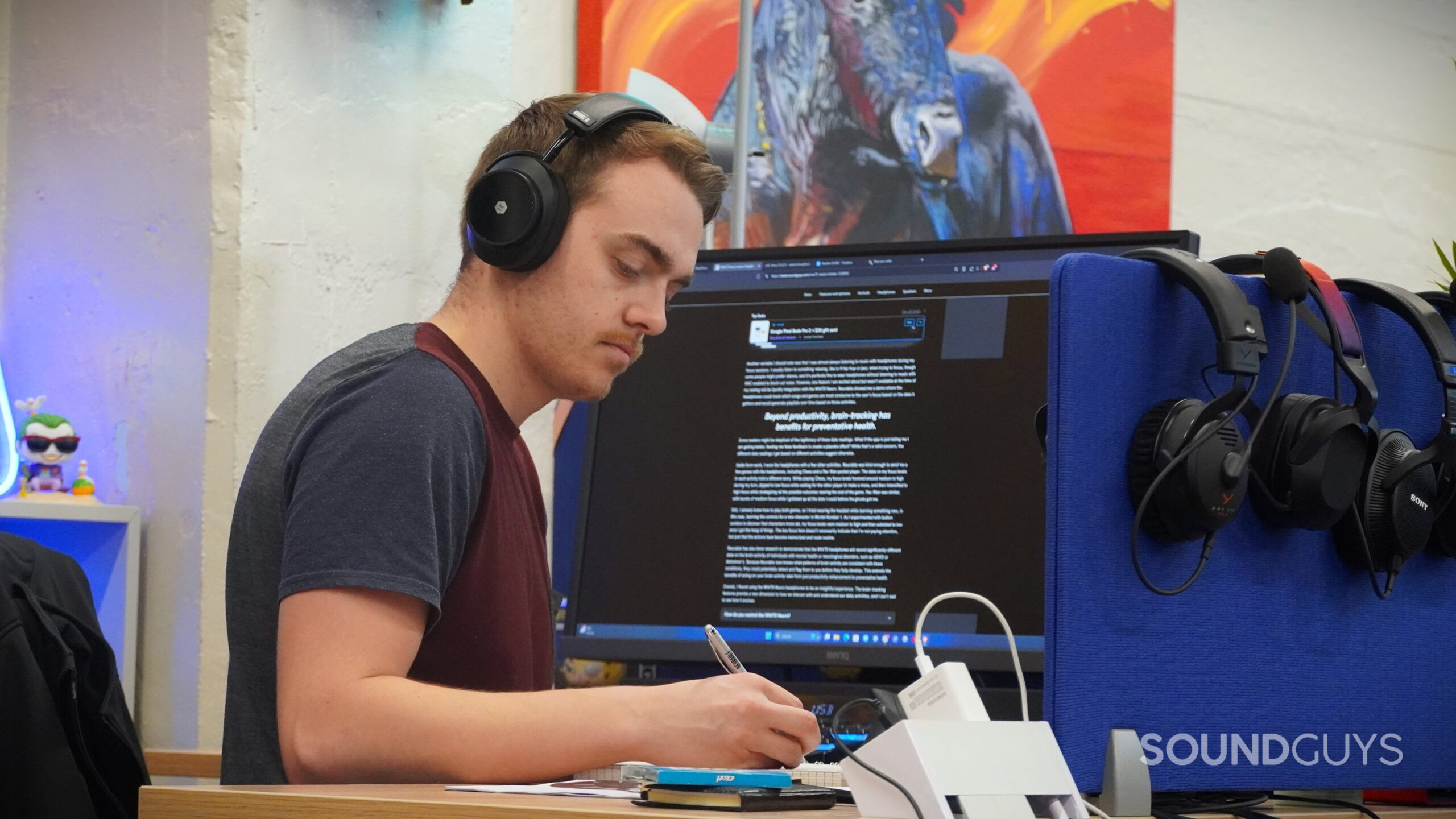 A man working at his desk wearing the MW75 Neuro headphones A man working at his desk wearing the MW75 Neuro headphones