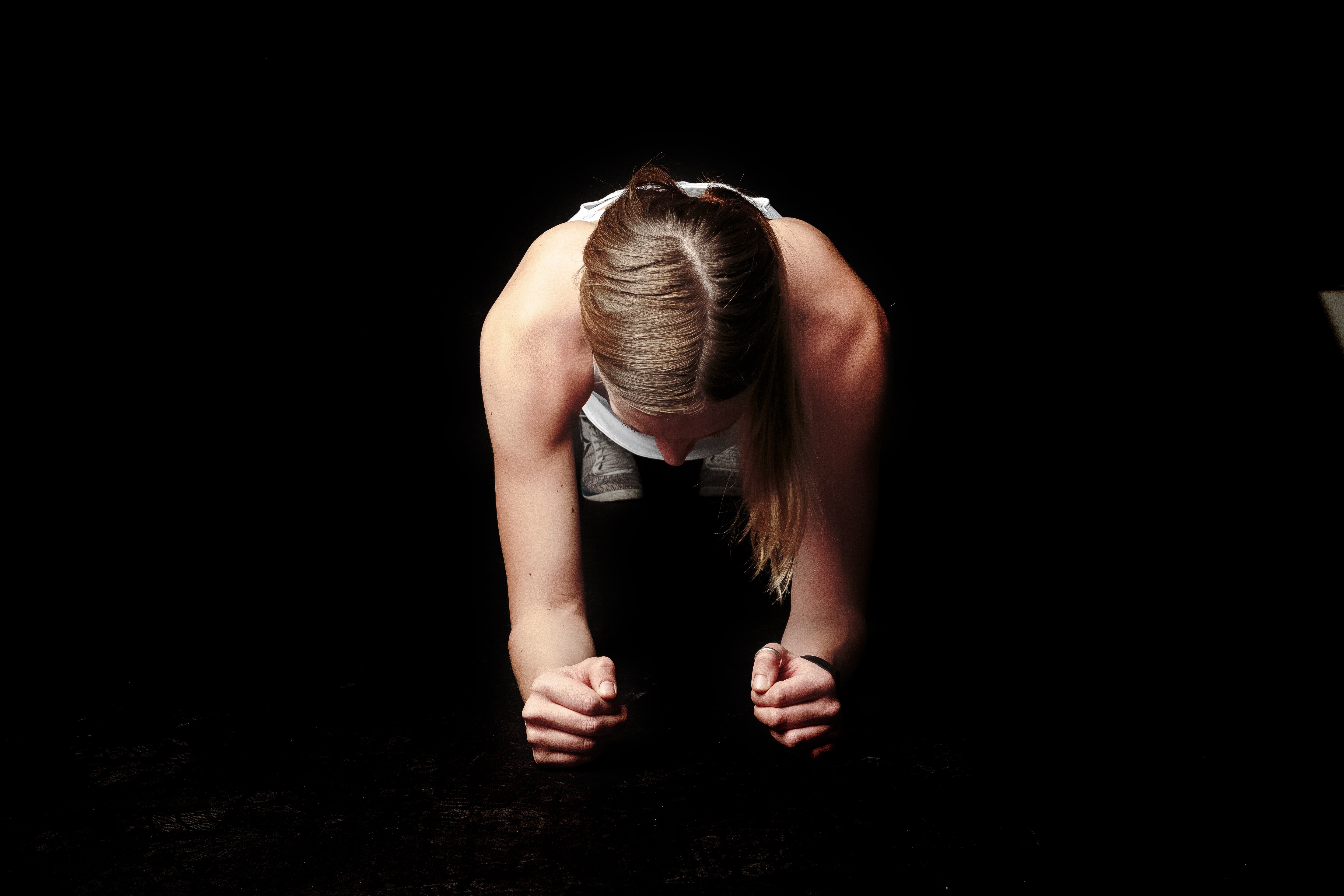 active-activity-black-background-2417490 Photo of Woman Doing Plank against Black Background