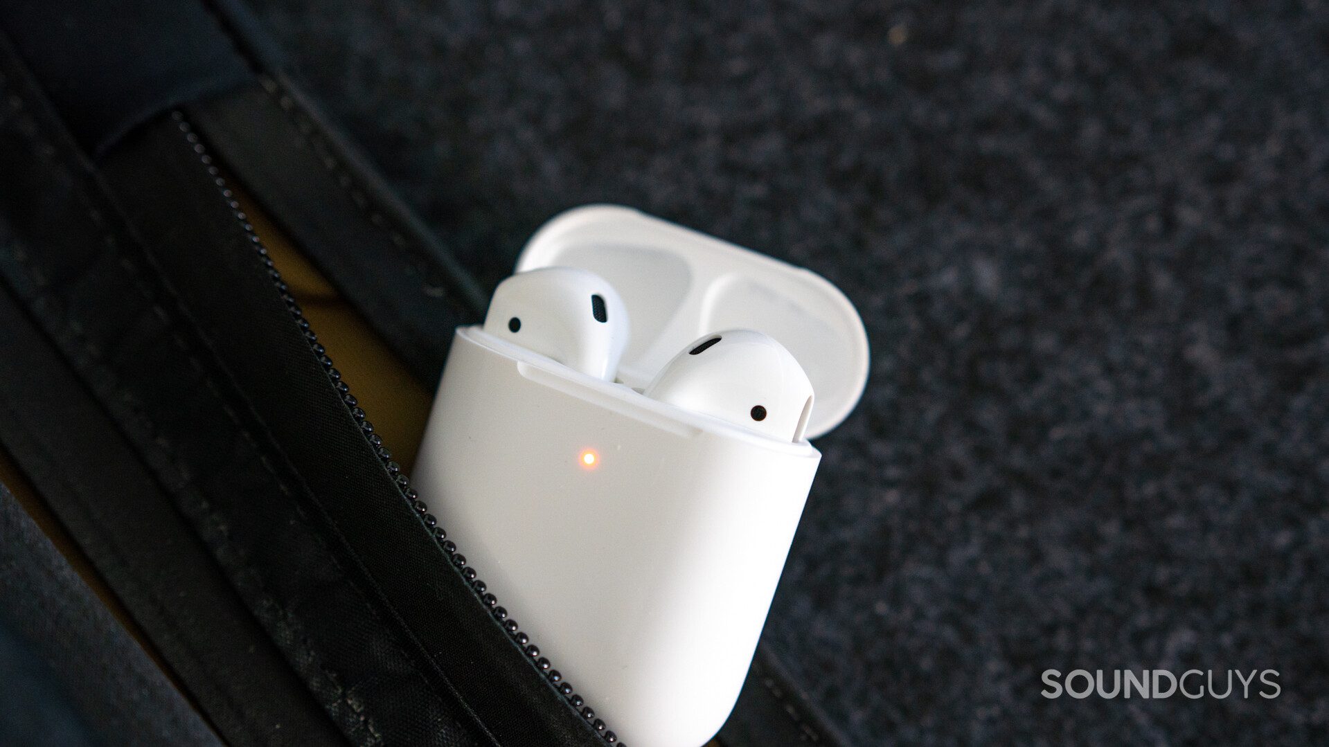 Airpods 2-3 The Apple Airpods case with the 'buds inside.