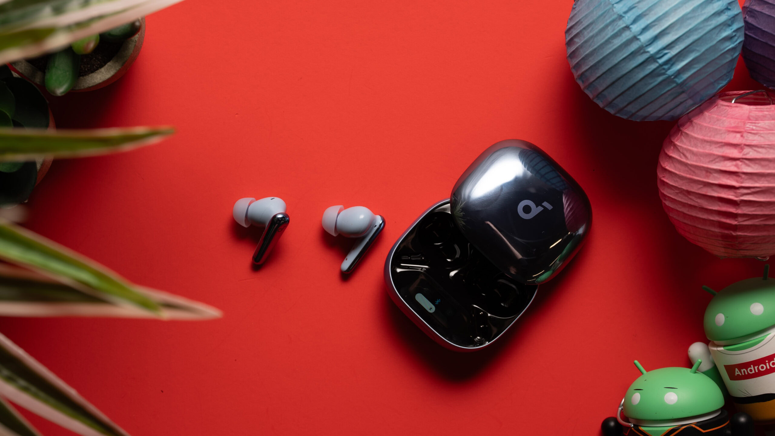 Anker Soundcore Liberty 4 Pro earbuds next to case