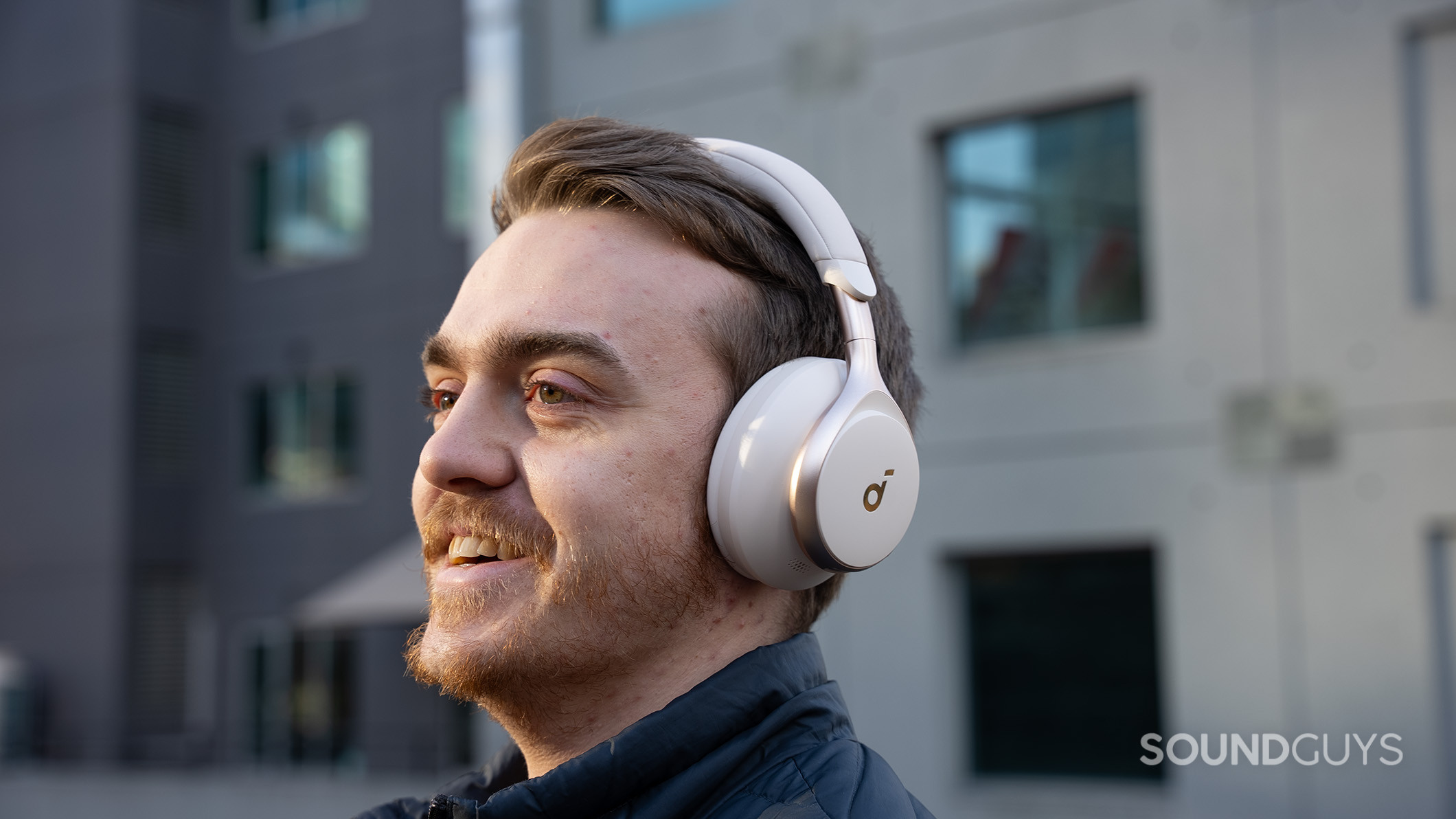 Anker Soundcore Space One on man smiling A man smiles while wearing the Anker Soundcore Space One.