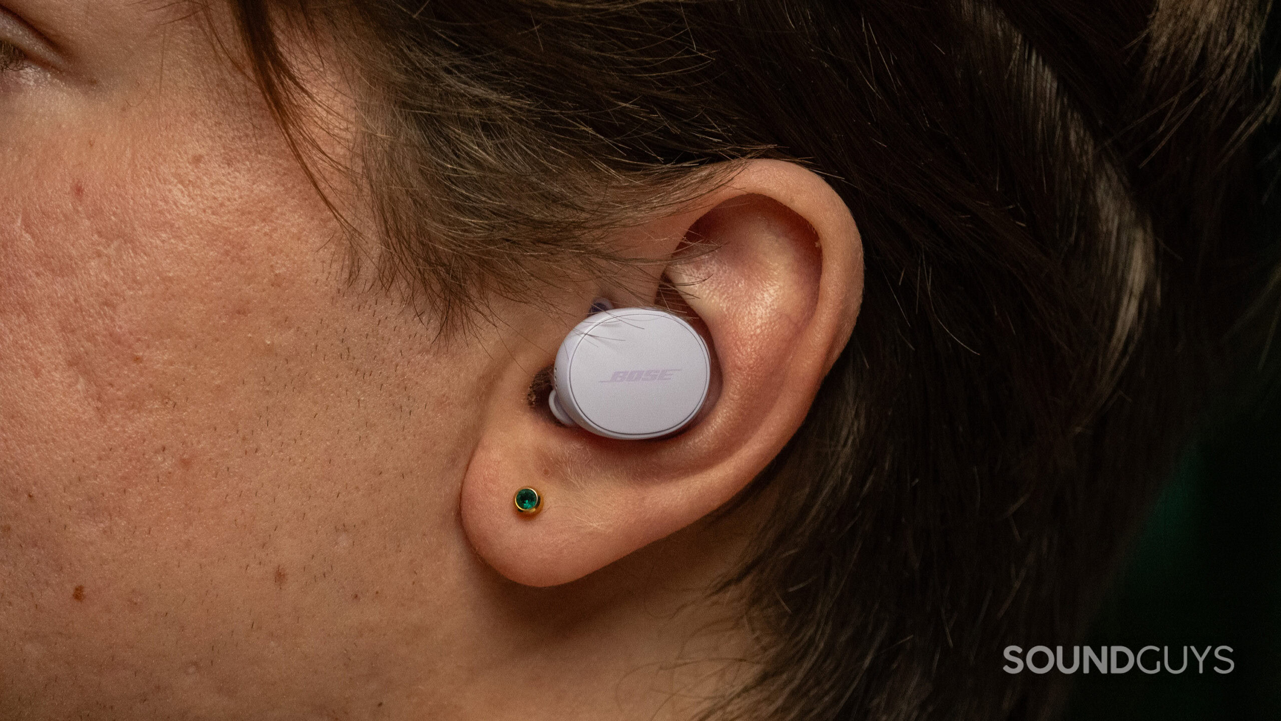 Bose QuietComfort Earbuds in ear Bose QuietComfort Earbuds in an ear.