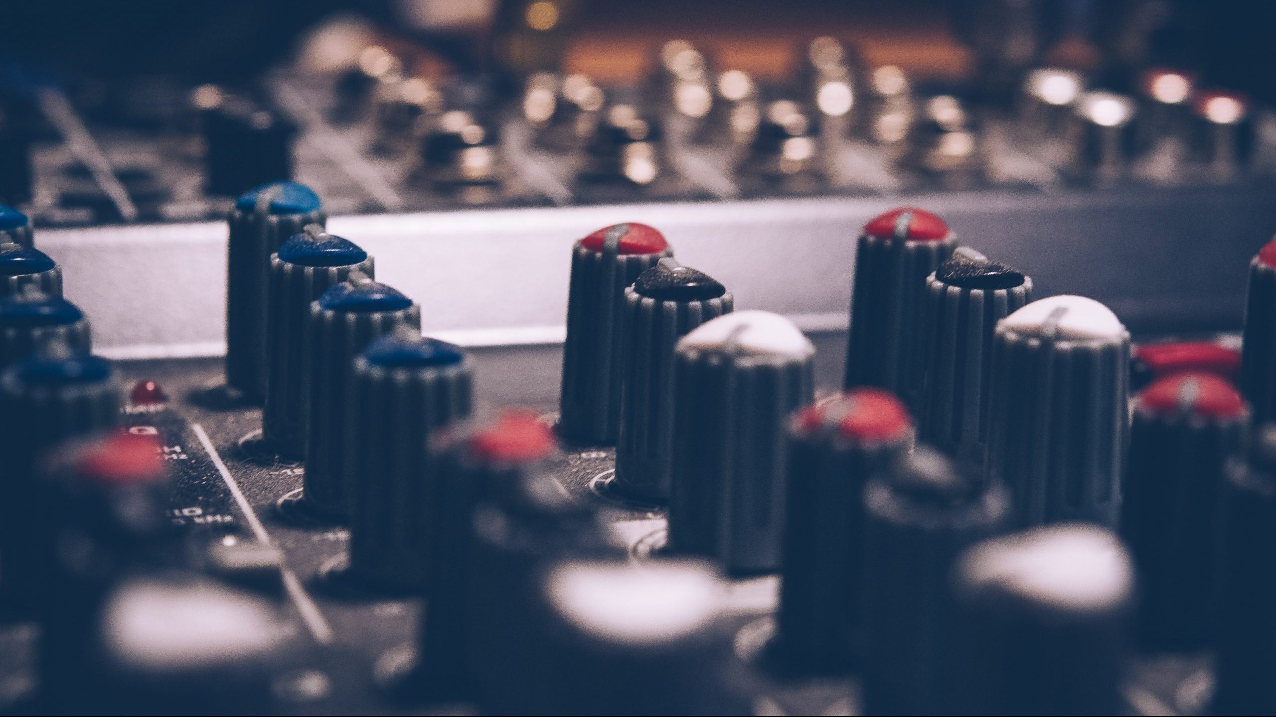 pexels-hendrik-b-744318 Audio mixer knobs close up.