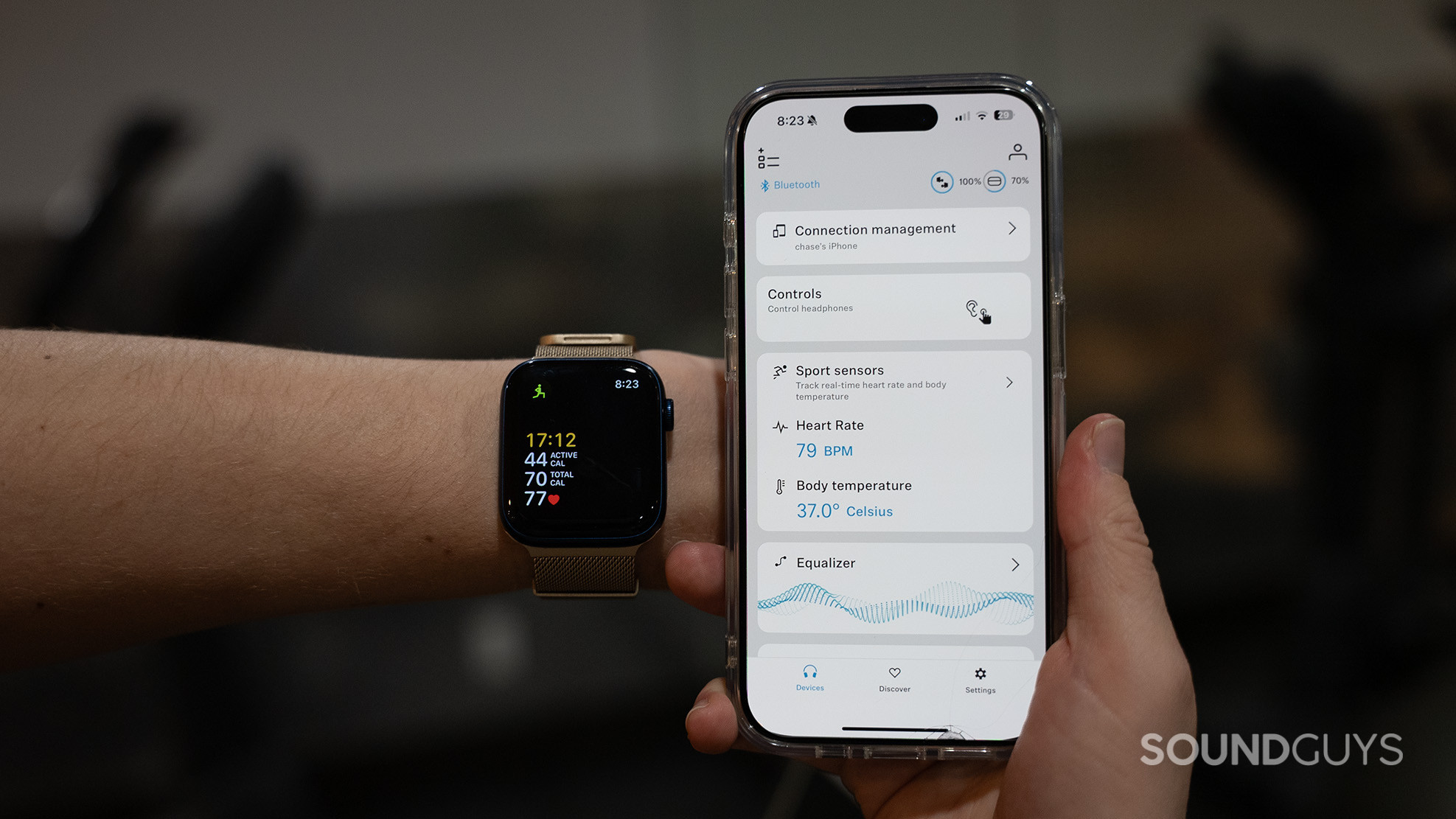 Sennheiser MOMENTUM Sport heart rate The Sennheiser Smart Control app showing a heart rate reading of 79 bpm next to an Apple Watch showing a reading of 77 bpm.