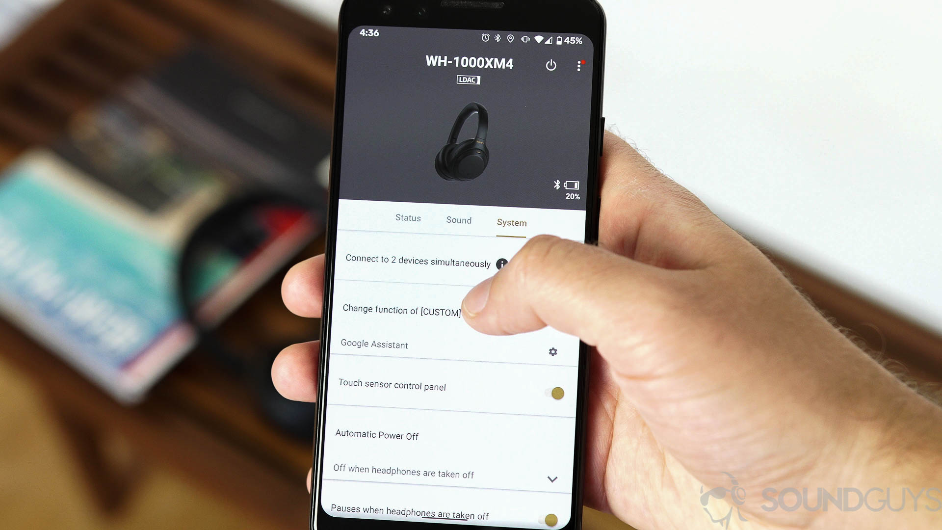 Sony headphones app for WH-1000XM4 A man uses a Pixel 3 with the Sony Headphones app open.